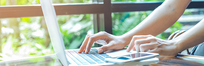 typing on a laptop