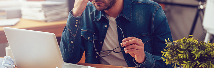 Person working hard at a laptop