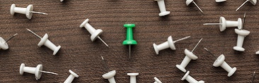 thumbtacks on a table